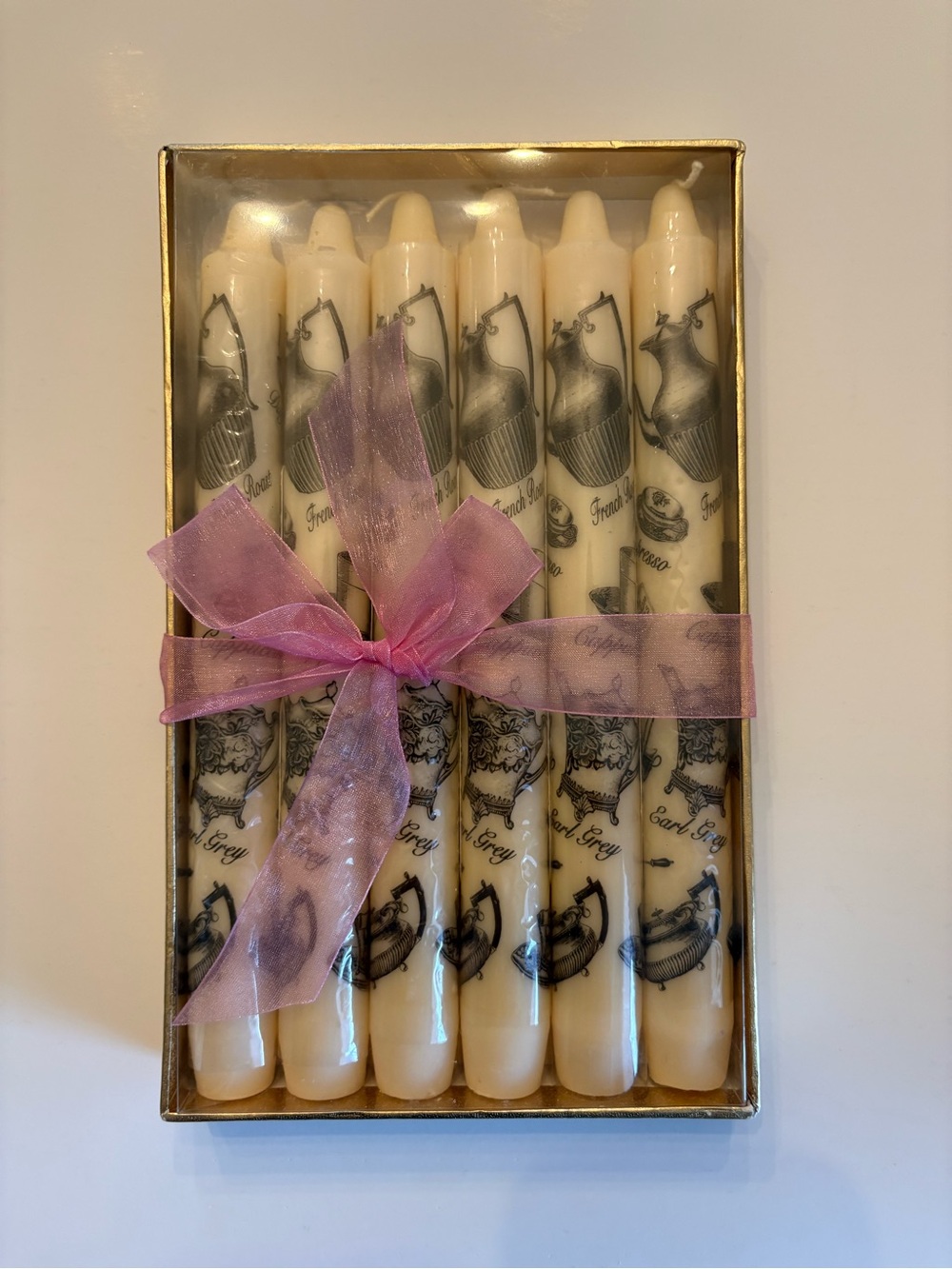 Enesco Ivory Taper Candles with Pink Sheer Ribbon